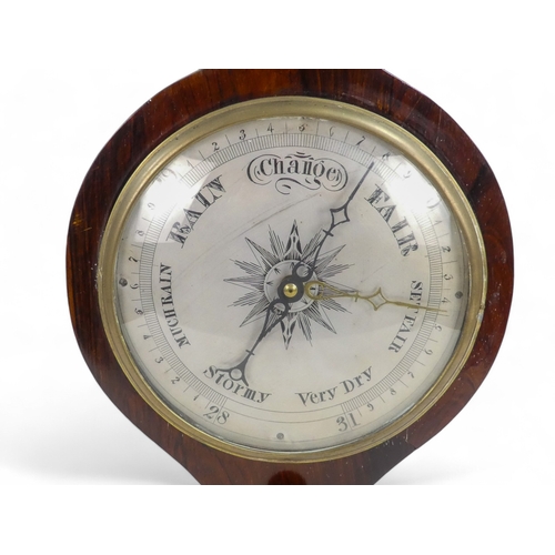 70 - A 19th century rosewood wheel barometer - incorporating hydrometer, thermometer and mirror.