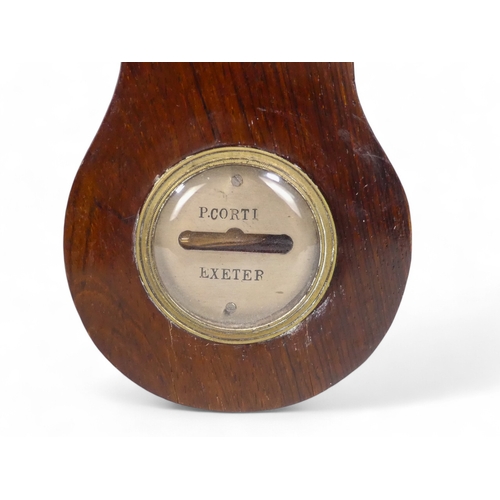 70 - A 19th century rosewood wheel barometer - incorporating hydrometer, thermometer and mirror.