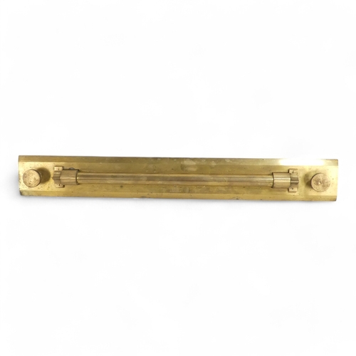 72 - An early 20th century brass parallel rule - manufactured by Universal Wood Working Co., in a wooden ... 