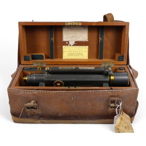 8 - An early 20th century surveyors level by W F Stanley - within a mahogany case with outer leather sli... 