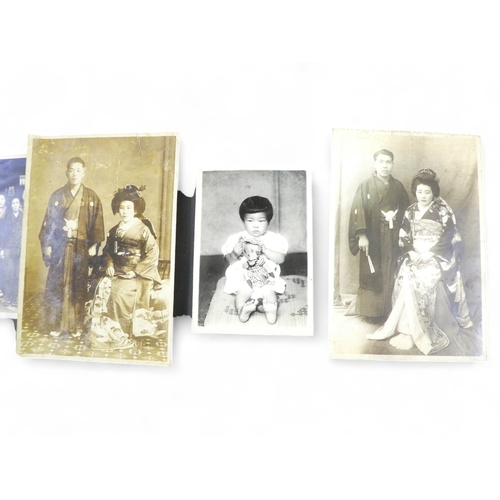 80 - A fascinating collection of 20th century Japanese photographs - many family groups together with pre... 