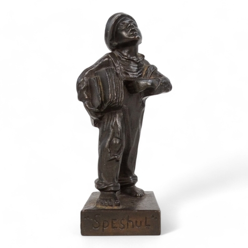 83 - A 20th century cast figure of a boy news vendor - titled 'Speshul', 18cm high, together with a Jagua... 