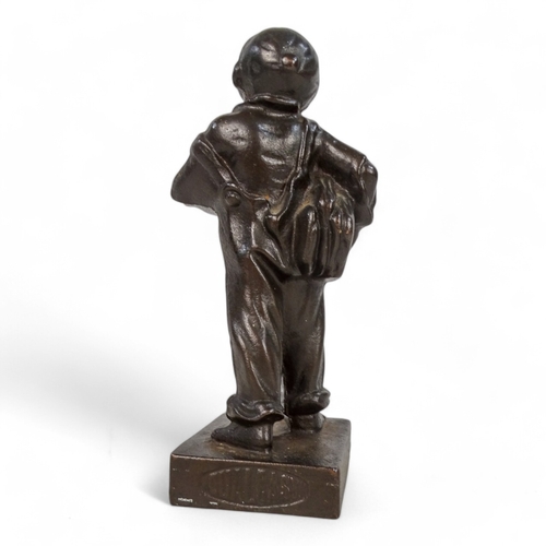 83 - A 20th century cast figure of a boy news vendor - titled 'Speshul', 18cm high, together with a Jagua... 