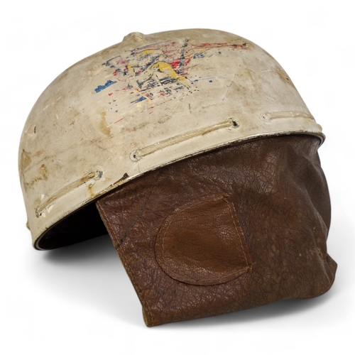 84 - A mid 20th century Campbell TuffNut motorcycle helmet - white painted with a brown rexine lining.