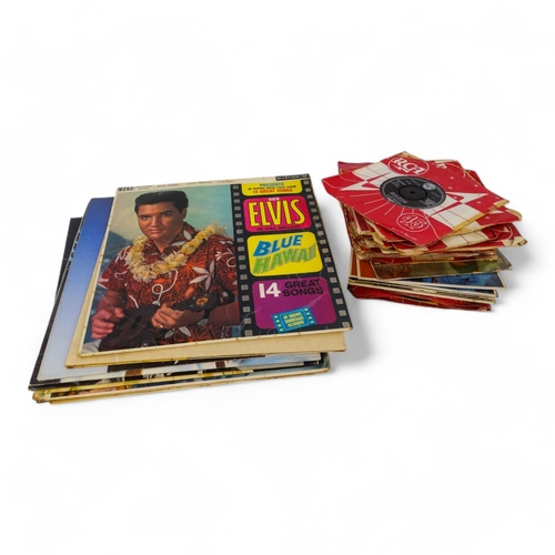 91 - A quantity of Elvis records - including forty one singles 1957-1970, seven EP's 1957-1965 and sixtee... 