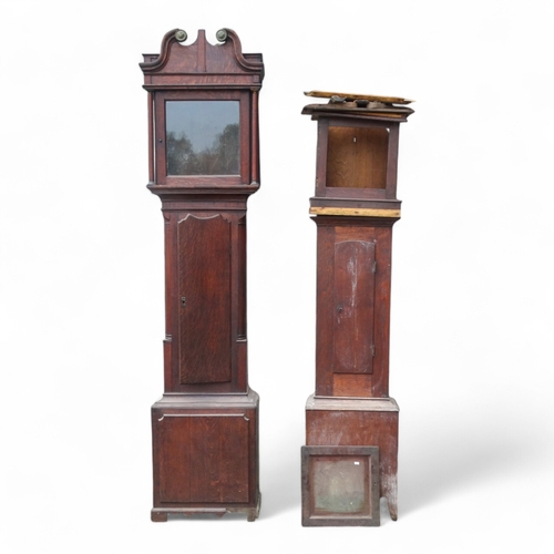 923 - Two early 19th century oak longcase clock cases. (2)