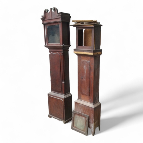 923 - Two early 19th century oak longcase clock cases. (2)