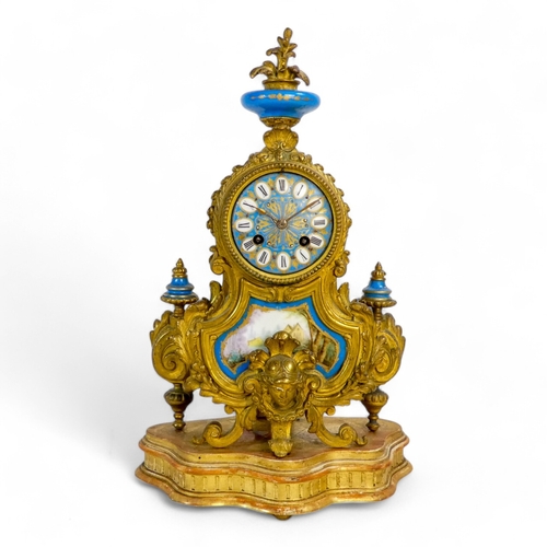 928 - A late 19th century Sevres style mantel clock - with ormolu mounts, the dial set out in Roman numera... 