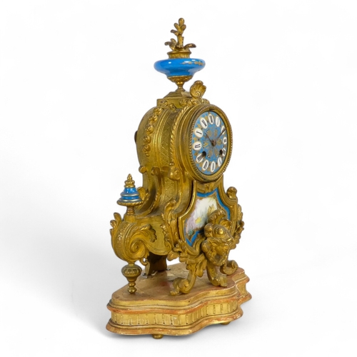 928 - A late 19th century Sevres style mantel clock - with ormolu mounts, the dial set out in Roman numera... 