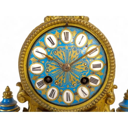 928 - A late 19th century Sevres style mantel clock - with ormolu mounts, the dial set out in Roman numera... 