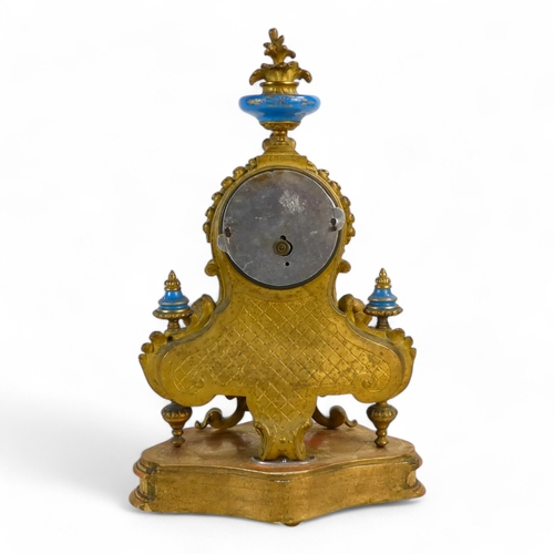 928 - A late 19th century Sevres style mantel clock - with ormolu mounts, the dial set out in Roman numera... 