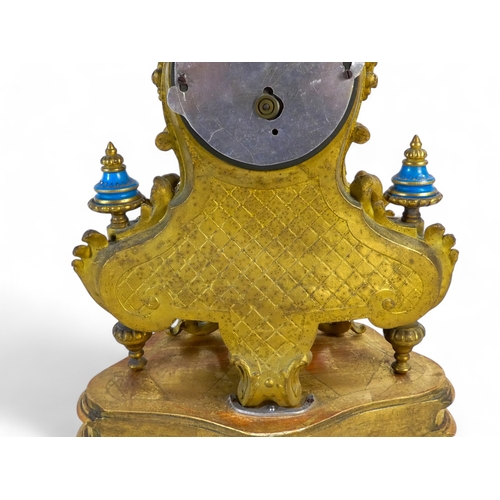 928 - A late 19th century Sevres style mantel clock - with ormolu mounts, the dial set out in Roman numera... 