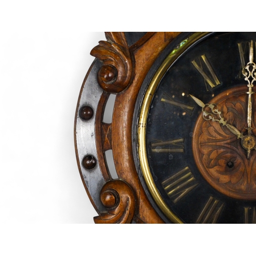 929 - A late 19th century walnut French vineyard clock - cartouche shaped with carved foliage, the carved ... 