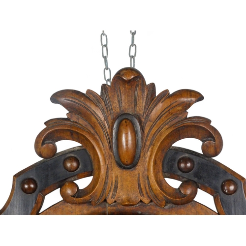 929 - A late 19th century walnut French vineyard clock - cartouche shaped with carved foliage, the carved ... 