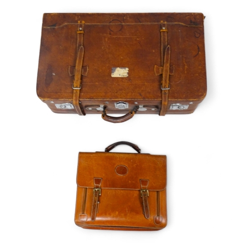 944 - A mid 20th century tan leather suitcase - with chrome fittings, 70cm wide, together with a tan leath... 