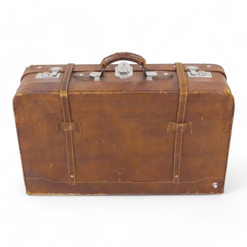 944 - A mid 20th century tan leather suitcase - with chrome fittings, 70cm wide, together with a tan leath... 