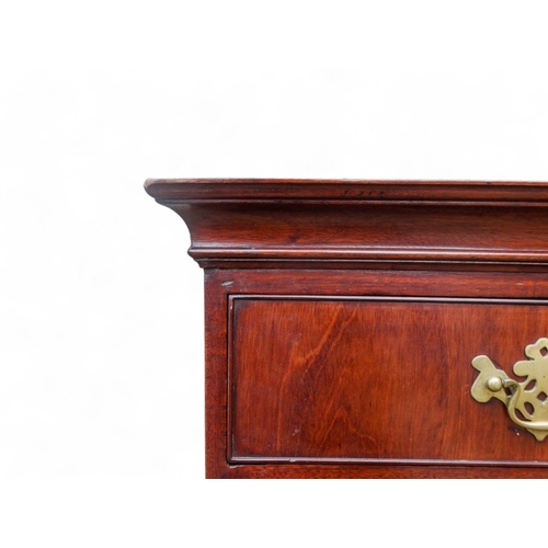 945 - A George II walnut chest on chest - of small proportions, the upper section with an arrangement of t... 