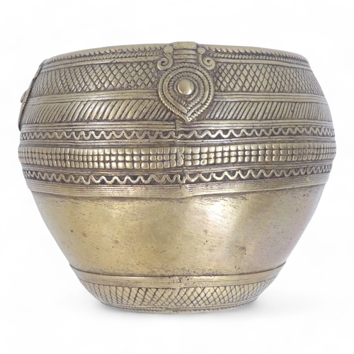 95 - An African brass bowl - with scalloped and linear decoration and a ring handle, 15cm diameter, toget... 