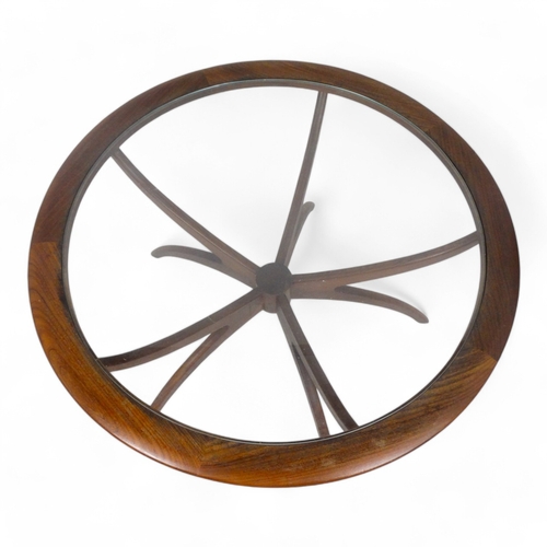 974 - Victor Wilkins for G-Plan - a teak Astro Spider circular table, with inset clear glass top raised on... 