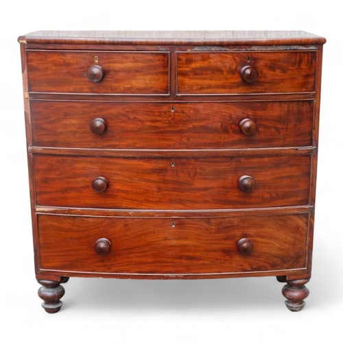 976 - A 19th century mahogany bowfront chest of drawers - with an arrangement of two short and three long ... 