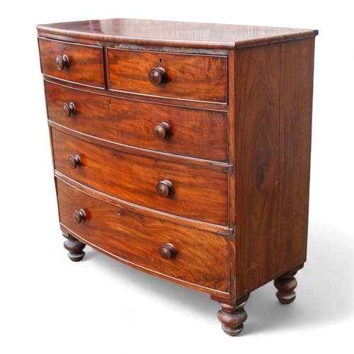 976 - A 19th century mahogany bowfront chest of drawers - with an arrangement of two short and three long ... 