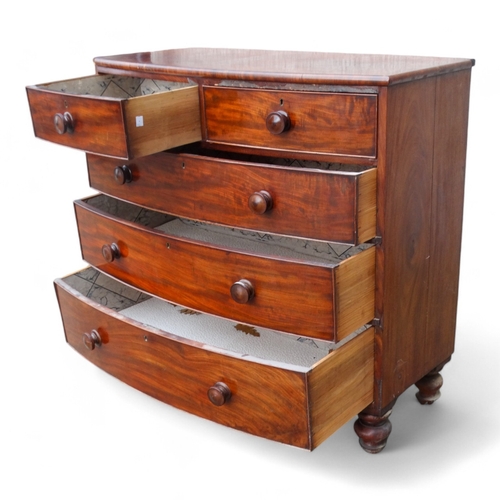 976 - A 19th century mahogany bowfront chest of drawers - with an arrangement of two short and three long ... 