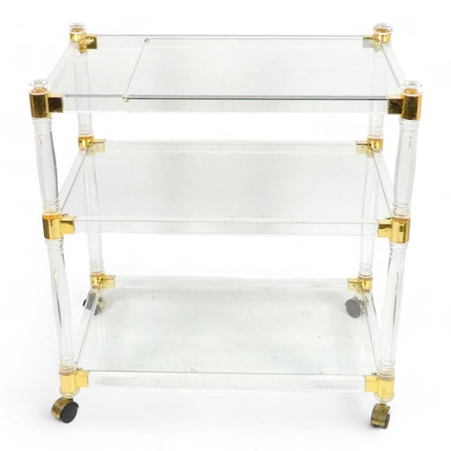 978 - A vintage glass and Lucite drinks trolly - in the manner of Romeo Rega, the rectangular three quarte... 