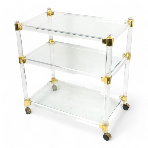 978 - A vintage glass and Lucite drinks trolly - in the manner of Romeo Rega, the rectangular three quarte... 