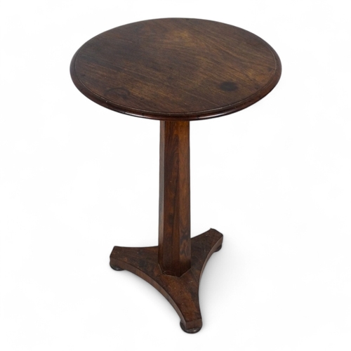 980 - An early Victorian rosewood occasional table - the circular top above a tapering octagonal support a... 