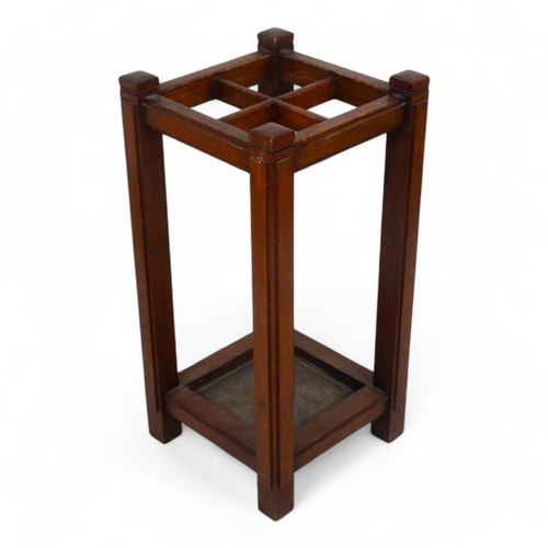 981 - An early 20th century walnut stick stand - in an Art Deco style, square with four divisions 31 x 31 ... 