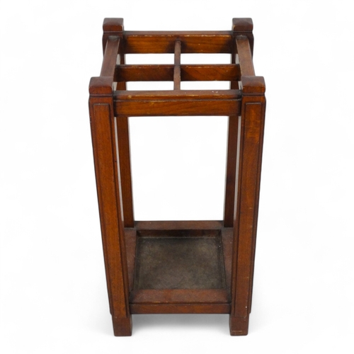 981 - An early 20th century walnut stick stand - in an Art Deco style, square with four divisions 31 x 31 ... 