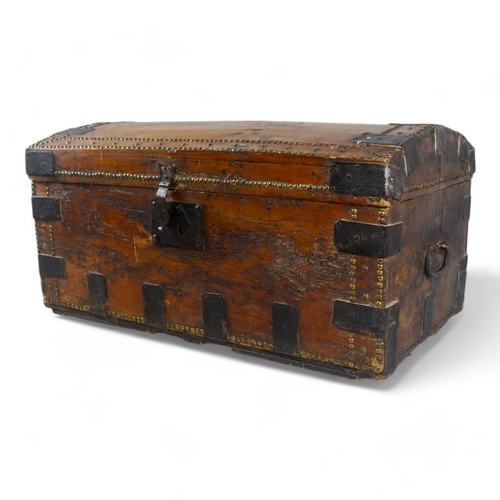 984 - A 19th century pine dome topped trunk - with steel binding, brass studs and drop handles, 89 x 50 x ... 