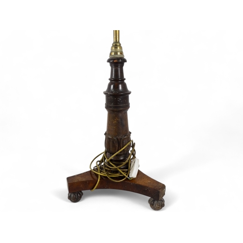 986 - A William IV rosewood firescreen stand - now converted as a standard lamp, with a tripod base, 136cm... 