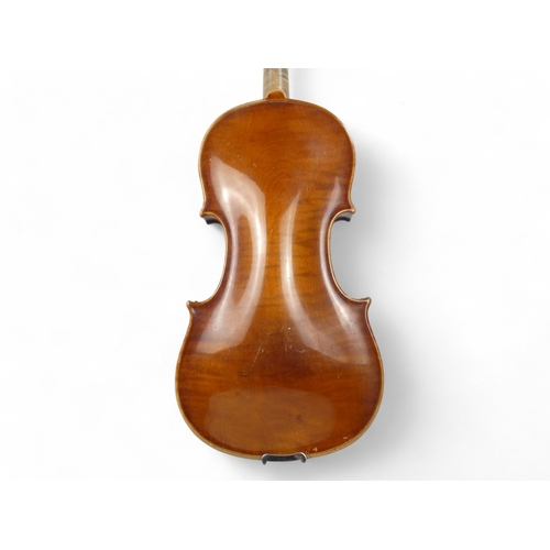 9 - A 19th century German violin - with a one piece back measuring 37cm, interior label 'Sebastian Cappa... 