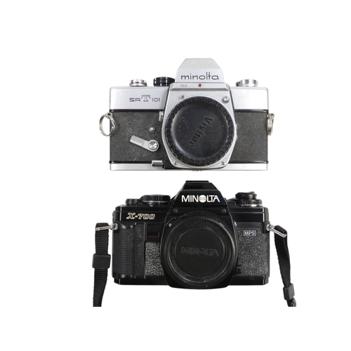 113 - A Minolta X-700 35mm SLR camera body - together with two other similar bodies, an SRT 101 body and s... 