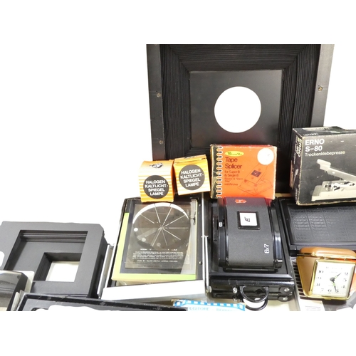 114 - A quantity of peripheral camera photographic equipment - including large format camera cassettes, mo... 