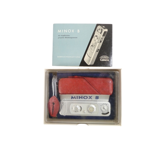 118 - A Minox model B miniature camera - circa 1964, no. 717 332, with inner and outer boxes, red outer ca... 