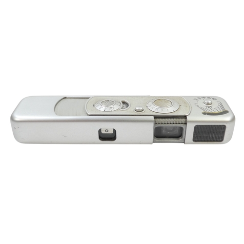 122 - A Minox model B miniature camera - no. 778 655, circa 1962, with a brown leather case.