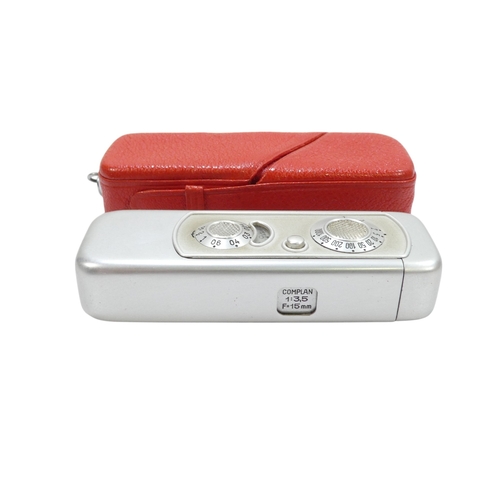 126 - A Minox model B miniature camera - no. 22 786, circa 1949, with a red leather case.