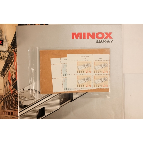 148 - A quantity of Minox ephemera - including two early guide books and two early film sleeves, together ... 