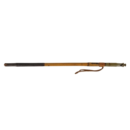 15 - An early 20th century riding crop - bamboo and fitted with a whistle to the handle, together with a ... 