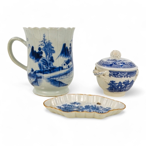 206 - A 19th century chinoiserie pearlware mug - decorated with a bridge and temple, 13cm high.