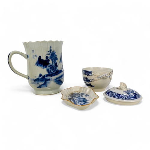 206 - A 19th century chinoiserie pearlware mug - decorated with a bridge and temple, 13cm high.