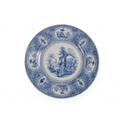 225 - An early 19th century blue and white plate - Samuel Alcock & Co. decorated with figures in an exotic... 