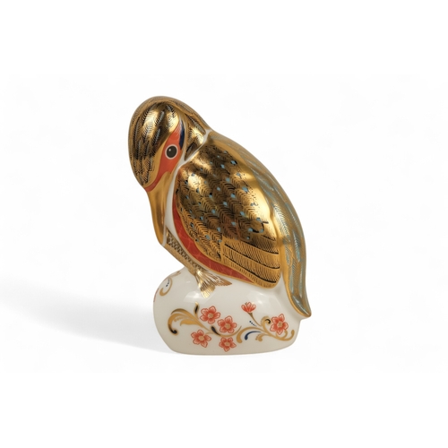 235 - A Royal Crown Derby kingfisher paperweight - perched with a fish, 11cm high, together with two furth... 