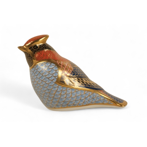 236 - A Royal Crown Derby wren paperweight - 6cm high, together with two further birds. (3)