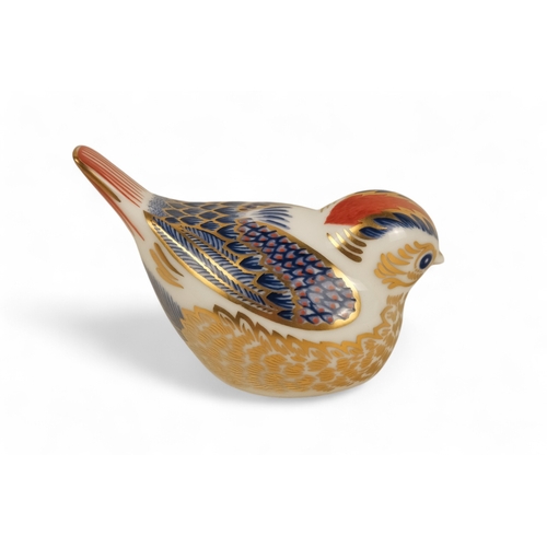 236 - A Royal Crown Derby wren paperweight - 6cm high, together with two further birds. (3)