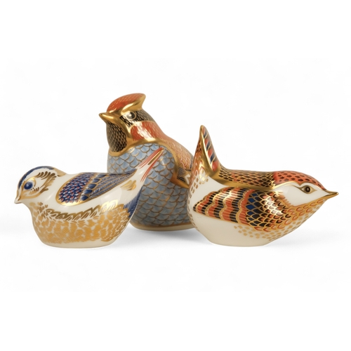 236 - A Royal Crown Derby wren paperweight - 6cm high, together with two further birds. (3)