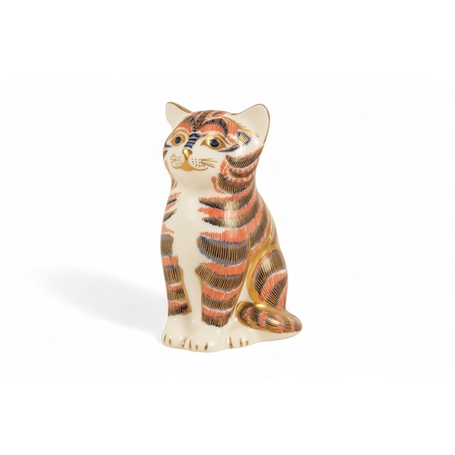 238 - A Royal Crown Derby cat paperweight - seated, 14cm high, together with three further various cats. (... 