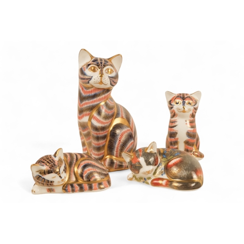 238 - A Royal Crown Derby cat paperweight - seated, 14cm high, together with three further various cats. (... 